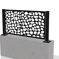 Black fence with a pattern on a concrete wall