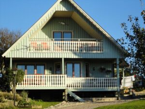 Hus-innan-glasräcke